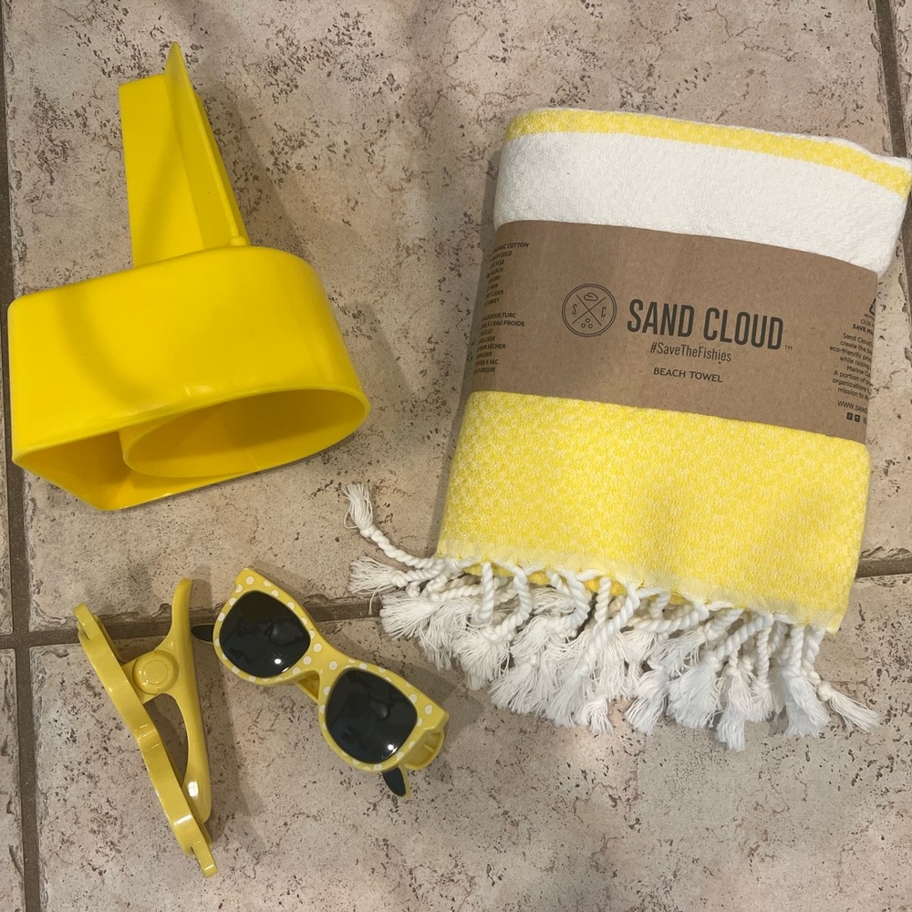 Sand Cloud Beach towel. Beach drink holder and 2 towel clips